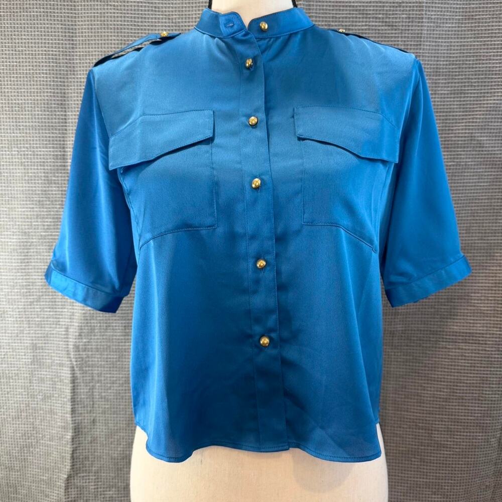 Blue blouse with gold buttons